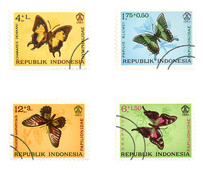 Image showing Colorful butterflies on post stamps