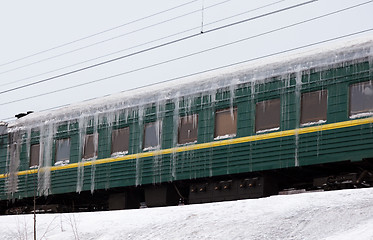 Image showing Passenger train covered with ice