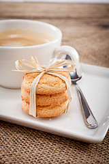 Image showing fresh aromatic coffee and cookies on table