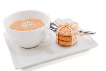 Image showing fresh aromatic coffee and cookies on table