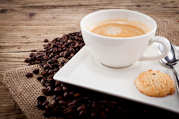 Image showing fresh aromatic coffee and cookies on table