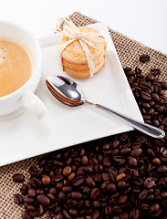 Image showing fresh aromatic coffee and cookies on table