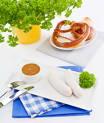 Image showing weisswurst white sausages and sweet mustard with pretzel 