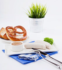 Image showing weisswurst white sausages and sweet mustard with pretzel 