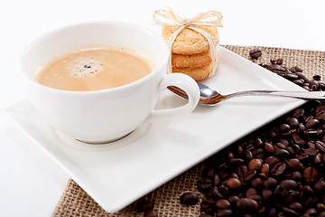 Image showing fresh aromatic coffee and cookies on table