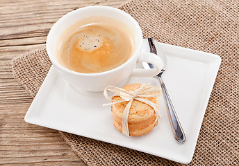 Image showing fresh aromatic coffee and cookies on table