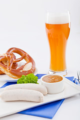 Image showing weisswurst white sausages and sweet mustard with pretzel 