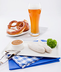 Image showing weisswurst white sausages and sweet mustard with pretzel 