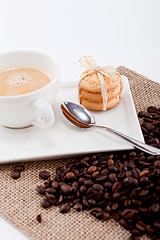 Image showing fresh aromatic coffee and cookies on table