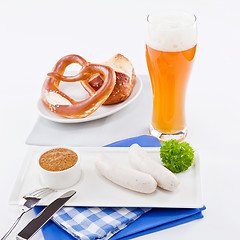 Image showing weisswurst white sausages and sweet mustard with pretzel 