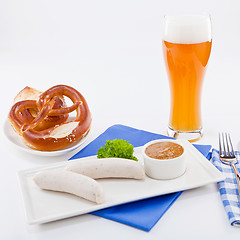 Image showing weisswurst white sausages and sweet mustard with pretzel 