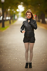 Image showing young brunette woman portrait in autumn color