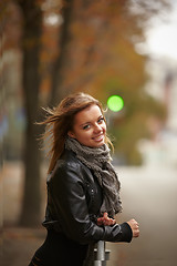 Image showing Beautiful girl in autumn city