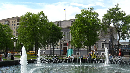 Image showing People have a rest in park with fountains