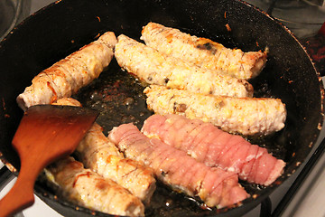 Image showing Process of cooking of chops on the pan