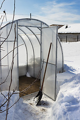 Image showing A small greenhouse in winter