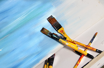 Image showing Art palette and paintbrushes