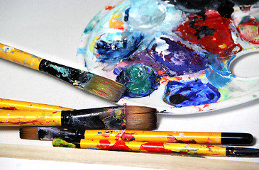 Image showing Art palette and paintbrushes