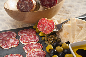 Image showing cold cut platter with pita bread and pickles