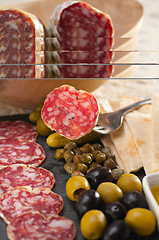 Image showing cold cut platter with pita bread and pickles