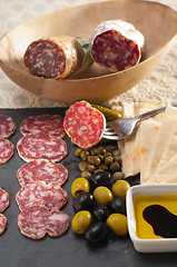 Image showing cold cut platter with pita bread and pickles