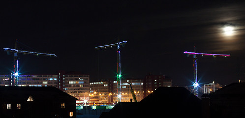 Image showing construction site with tall cranes