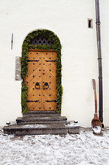 Image showing The ancient door decorated to Christmas