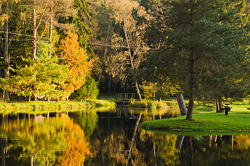 Image showing Autumn park with a pond