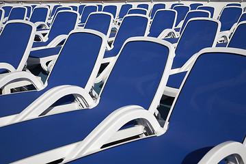 Image showing empty sun loungers