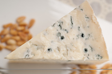 Image showing gorgonzola cheese fresh cut and pinenuts