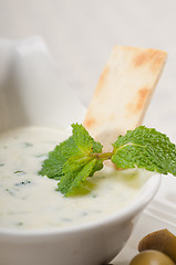 Image showing Greek Tzatziki yogurt dip and pita bread