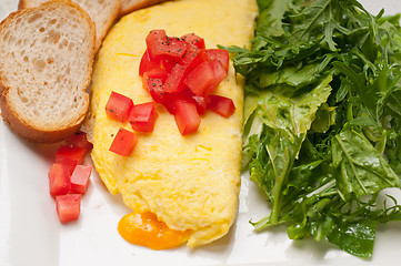 Image showing cheese ometette with tomato and salad