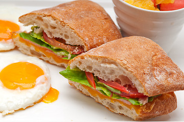 Image showing ciabatta panini sandwich eggs tomato lettuce