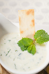 Image showing Greek Tzatziki yogurt dip and pita bread