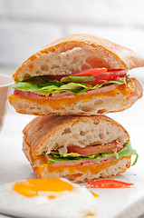 Image showing ciabatta panini sandwich eggs tomato lettuce