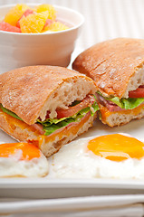 Image showing ciabatta panini sandwich eggs tomato lettuce