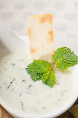 Image showing Greek Tzatziki yogurt dip and pita bread