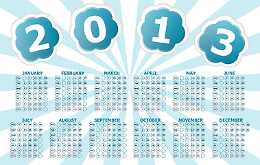 Image showing Simple 2013 year calendar with blue sun rays