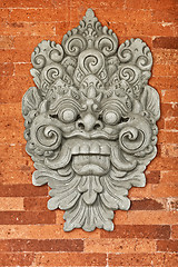 Image showing Stone bas-relief on the brick wall. Indonesia, Bali.