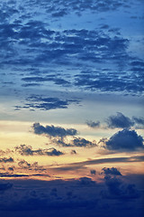 Image showing Vertical Beautiful cloudy sky at sunset