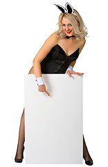 Image showing Blonde woman in rabbit costume with a white poster