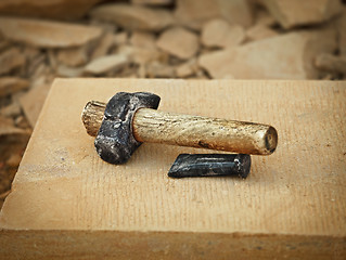 Image showing Old grunge hammer and metal boaster