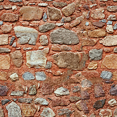 Image showing Seamless natural different size stones wall