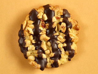 Image showing Cookie with chocolate and nuts