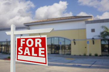 Image showing Vacant Retail Building with For Sale Real Estate Sign