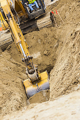 Image showing Excavator Tractor Digging A Trench