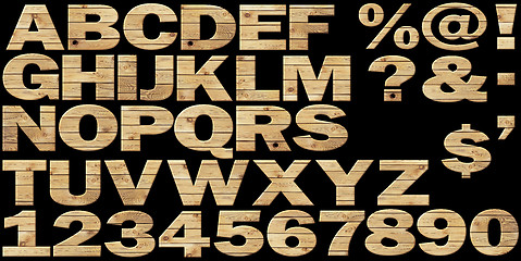 Image showing Set - wooden alphabet on a black background