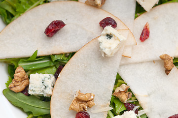 Image showing Fresh pears arugula gorgonzola cheese salad