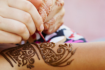 Image showing Henna art on woman's hand