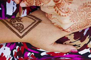 Image showing Henna art on woman's hand